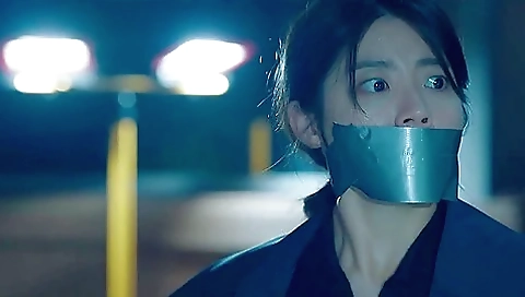 Korean Woman Wraparound Tape Gagged Korean Woman Wraparound Tape Gagged